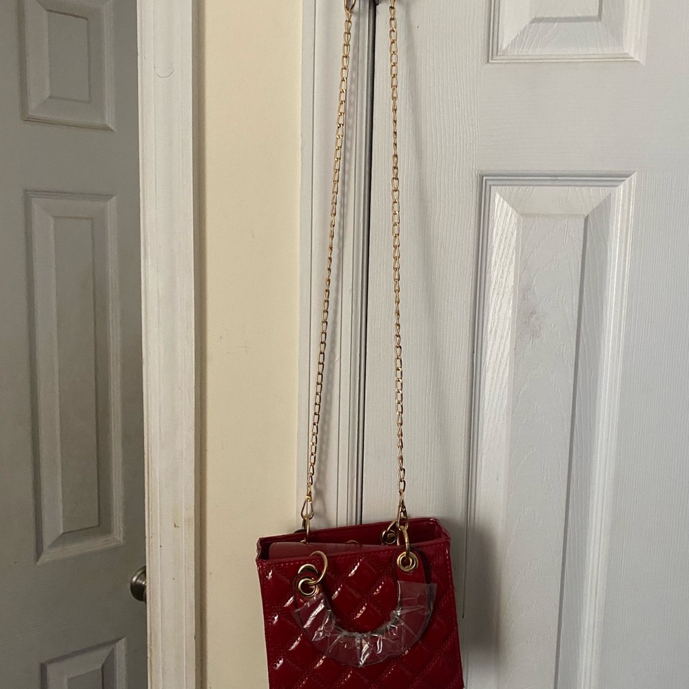 Small red quilted top handle/ shoulder evening bag